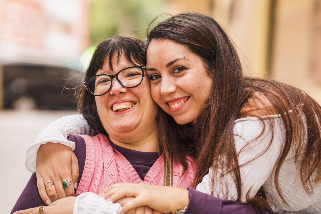 NDIS support worker providing emotional support to a participant with disability